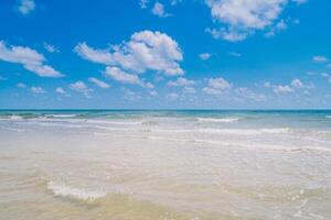 Blue ocean and blue sky with white clouds photo