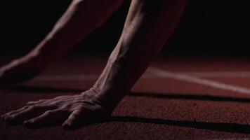 Runner Training In Stadium, Closeup Of Male Hands On Run Lane, Professional Runner Waiting For Start video