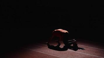 Motivated Sportsman Training On Race Track In Stadium, Back View Of Professional Runner In Low Start video