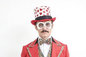 Portrait of a man in a red suit and a top hat photo