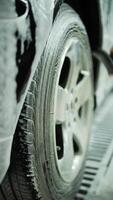 Washing a car wheel with a brush by hand video