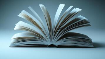 An open book lays on a surface, its pages elegantly fanned out, inviting curiosity photo