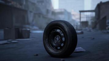 Abandoned tire on a deserted street in a post apocalyptic urban scene video