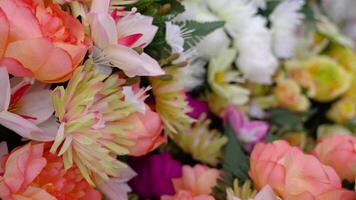 Flamboyant springtime flower bouquets on blurred background video