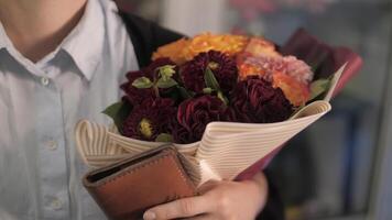 Attach the card to the terminal to print the receipt. A girl buys flowers video