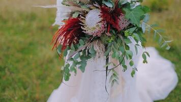 Bride holding wedding bouquet. video