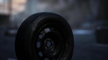 Abandoned tire in a desolate urban setting at dusk video