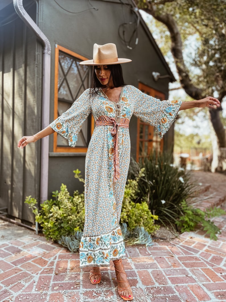 1970s Outfit Inspiration | 70s Costume Ideas Bohemian Spell Style Kimono Sleeve Maxi Dress Boho Festival Clothing Coachella Outfit Desert Flowy Hippie Gypsy Crochet Bridal Country $79.00 AT vintagedancer.com