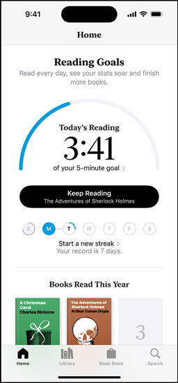 iPhone screen showing the Reading Goals interface in the Books app. At the top, there is a progress ring. Below the progress ring is the weekly reading streak tracker. At the bottom is the Books Read This Year section, which includes a row of two books, with an empty slot for a third