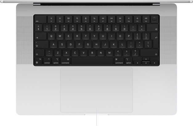 Top-down view of open MacBook Pro 16-inch showing Force Touch trackpad located below keyboard