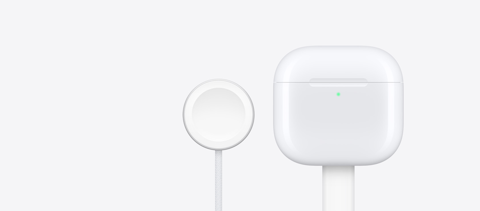 Airpods 4 laadimiskarp Apple Watch laadija kõrval.