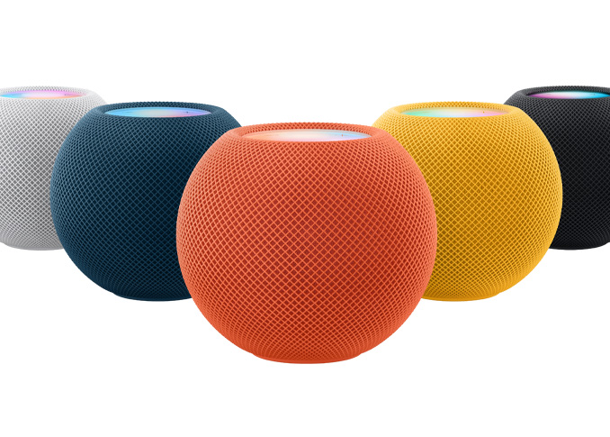 From left to right: one White, one Blue, one Orange, one Yellow, and one Space Gray HomePod mini