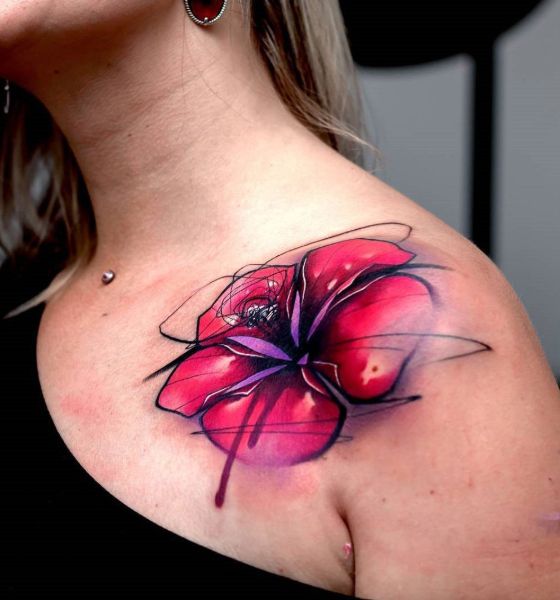 Abstract Lily Flower Tattoo on Collarbone