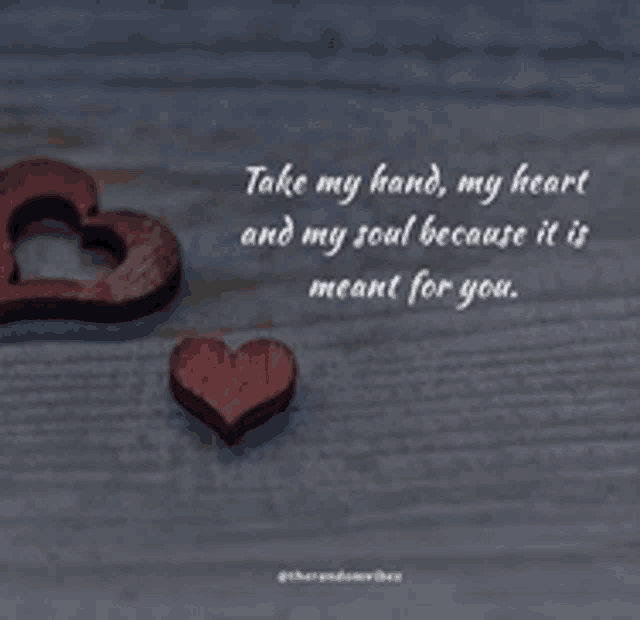 two wooden hearts with a quote that says take my hand my heart and my soul because it is meant for you ..