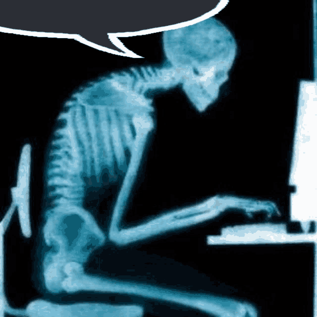 an x-ray of a skeleton typing on a keyboard with a speech bubble above it