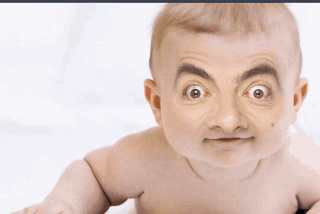 a baby that looks like mr bean with a beard