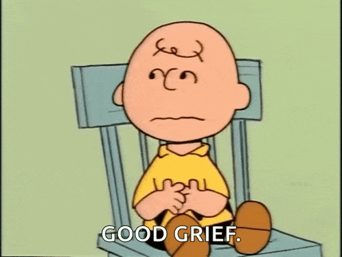 charlie brown is sitting in a chair with a sad look on his face and says `` good grief '' .