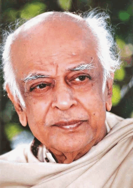 a close up of an older man 's face with a white shawl around his neck