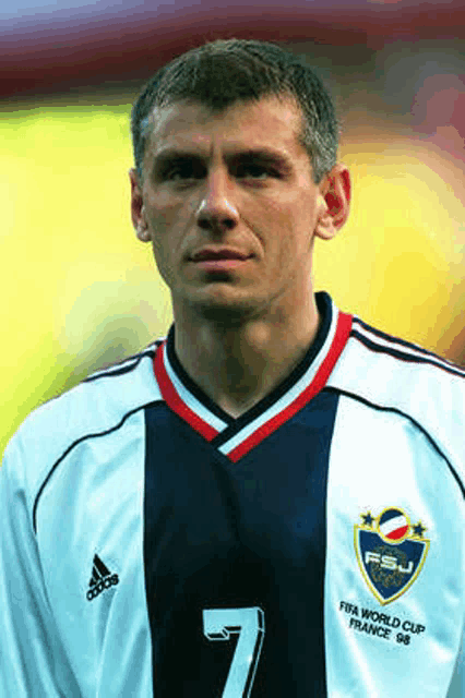 a man wearing a fifa world cup france 98 jersey