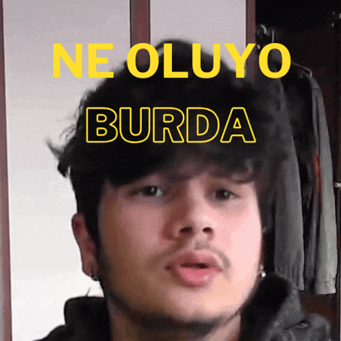 a man with the words ne oluyo burda written on his face