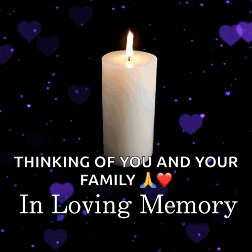 a candle with the words thinking of you and your family in loving memory on it