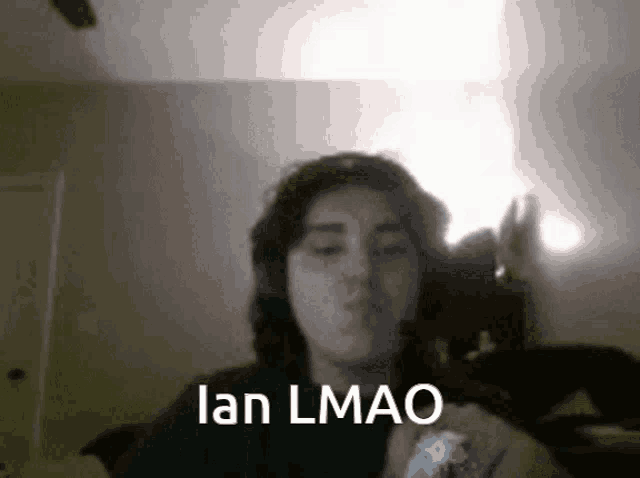 a person is blowing a kiss with the words lan lmao written on the bottom