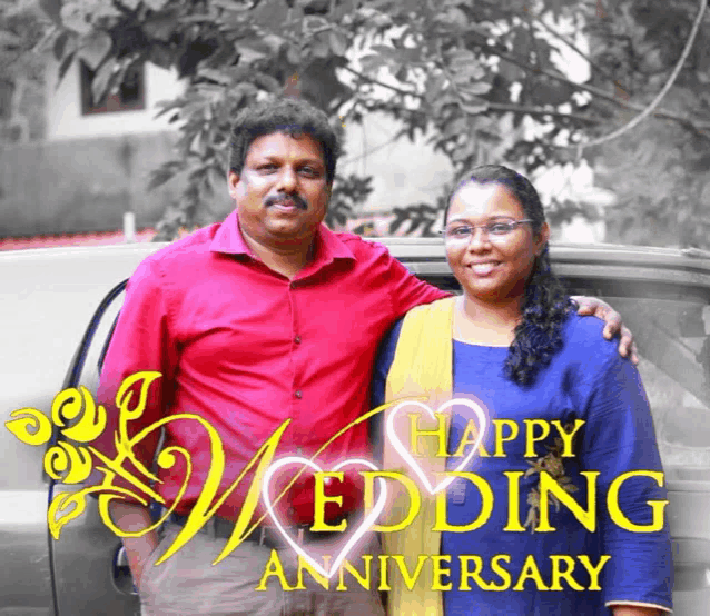 a man and a woman are posing for a picture with the words happy wedding anniversary behind them