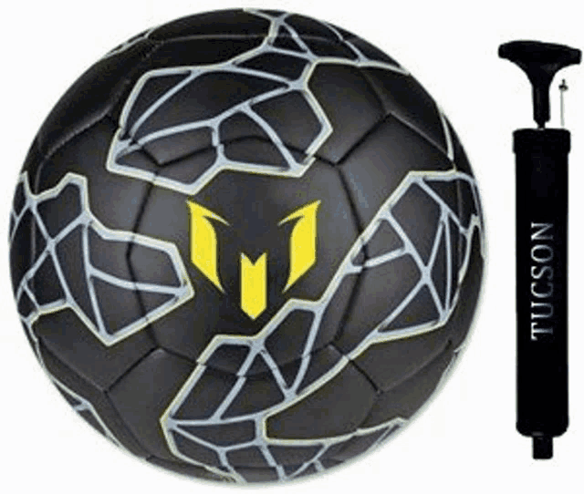 a black tucson soccer ball next to a pump