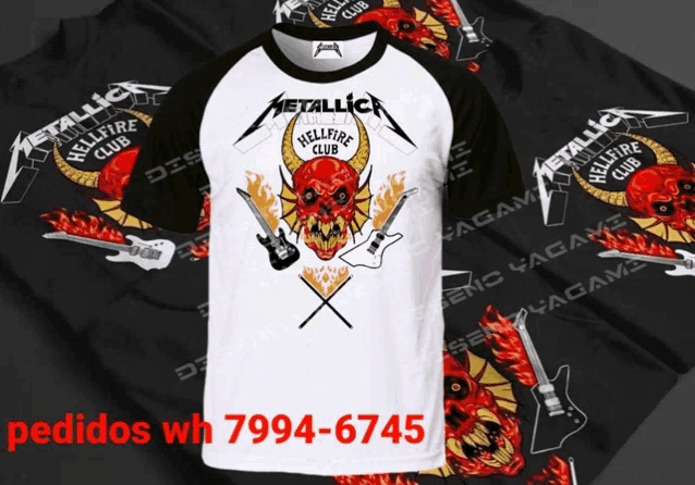 a metallica shirt with a skull and guitars