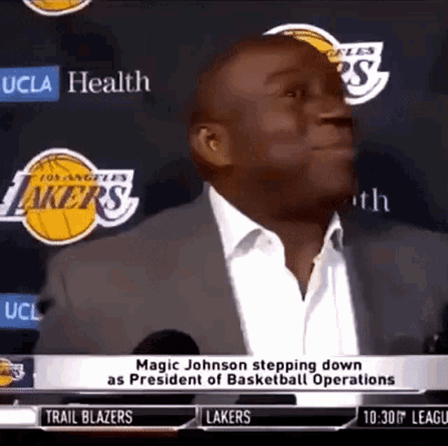 magic johnson is stepping down as president of the lakers