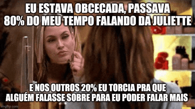 a woman is looking at herself in a mirror with a caption that says eu estava obcecada passava