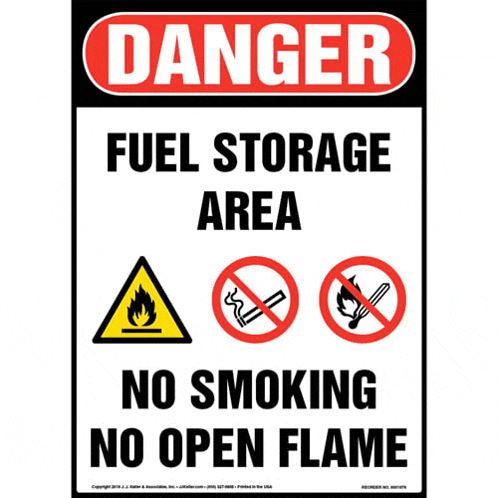 a danger sign for the fuel storage area says no smoking no open flame