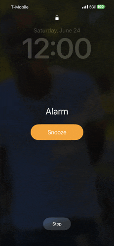 a t-mobile phone displays an alarm clock on saturday june 24th