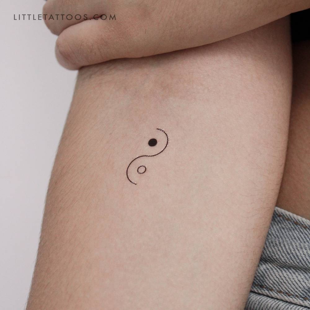 Minimalist Yin Yang temporary tattoo done on the inner