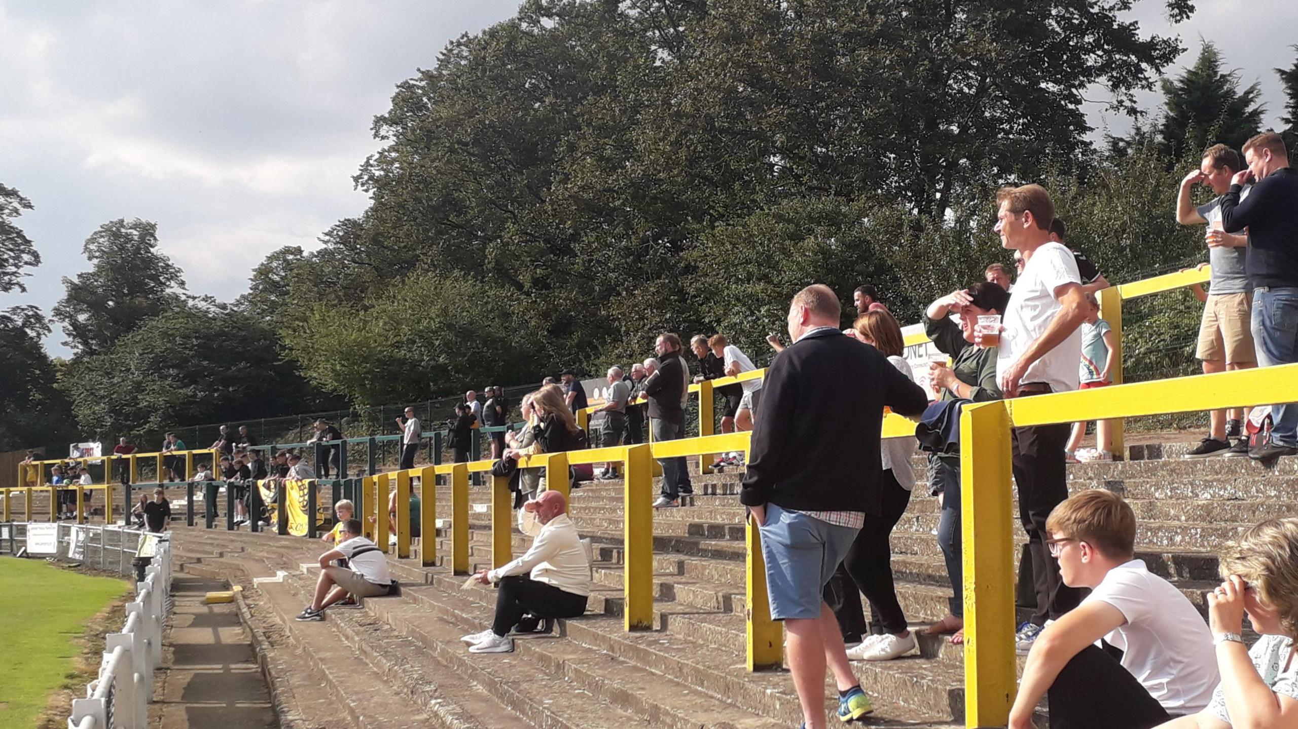 Fans on the terrace at Top Field, Hitchin Town FC's stadium.