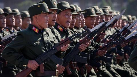 KPA soldiers march during a mass rally on Kim Il Sung square in Pyongyang on September 9, 2018