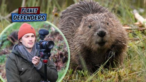 Jack from Planet Defenders poses with a camera, there's is a picture of a beaver behind him.