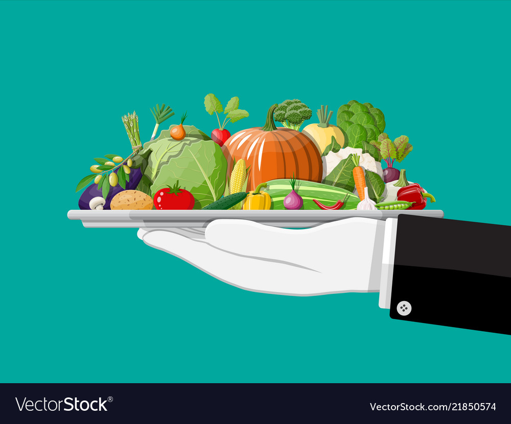 Tray full of vegetables in hand.