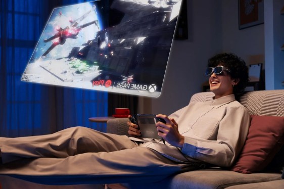 man reclining playing VR games