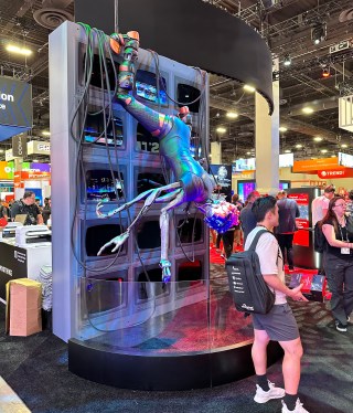 A statue of CrowdStrike’s action figure that represents the Scattered Spider cybercriminal group, seen at the Black Hat cybersecurity conference in August 2024.