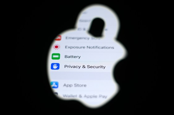 An iPhone with privacy and security settings is seen in this photo illustration.