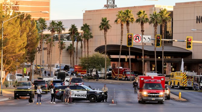 A Las Vegas Metropolitan Police Department vehicle blocks the road near the Trump International Hotel & Tower Las Vegas after a Tesla Cybertruck exploded in front of the entrance on January 01, 2025