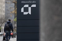 AtkinsRéalis Group Inc. reported its third-quarter profit edged lower compared with a year ago when it benefited from a gain on the sale of its Scandinavian engineering services business.AtkinsRealis headquarters are seen in Montreal, Friday, Nov. 10, 2023. THE CANADIAN PRESS/Christinne Muschi