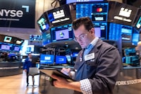 NEW YORK, NEW YORK - DECEMBER 31: Traders work on the floor of the New York Stock Exchange (NYSE) on the last day of trading for the year on December 31, 2024 in New York City. Stocks were up slightly in morning trading following a disappointing last few weeks of the year, which saw significant drops in the market value.  (Photo by Spencer Platt/Getty Images)