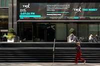 A person walks past the TMX Market Centre in Toronto, Wednesday, Sept. 11, 2024. THE CANADIAN PRESS/Paige Taylor White