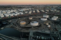 FILE PHOTO: Storage tanks for crude oil, gasoline, diesel, and other refined petroleum products are seen at the Kinder Morgan Terminal, viewed from the Phillips 66 Company's Los Angeles Refinery in Carson, California, U.S., March 11, 2022. Picture taken with a drone. REUTERS/Bing Guan/File Photo