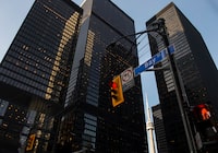 A red light on Bay Street in Canada's financial district is shown in Toronto on Wednesday, March 18, 2020.