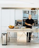 Opening onto the open-plan living and dining rooms, the aluminum Bulthaup System 20 kitchen with its nine-foot-long stainless steel island and Miele appliances has become a focal point of the house. Pressed in one seamless sheet of steel, the island, Picard says with the obvious pride of a satisfied customer, “is an amazing piece of engineering.”