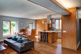 Flooring includes Teragren bamboo, cork in the kitchen, and porcelain at entry points. American Yellow Birch was used for the cabinets and trimming.

Photo by: Eric Hausman Photography