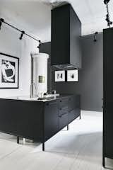 A modern, matte-black Vipp kitchen system in Gothenburg, Sweden.